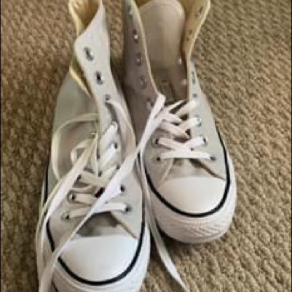 Woman converse high top